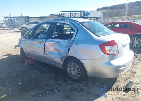 2012 Suzuki Sx4 Le/Le Popular z USA, uszkodzony, nr VIN JS2YC5A37C6302330